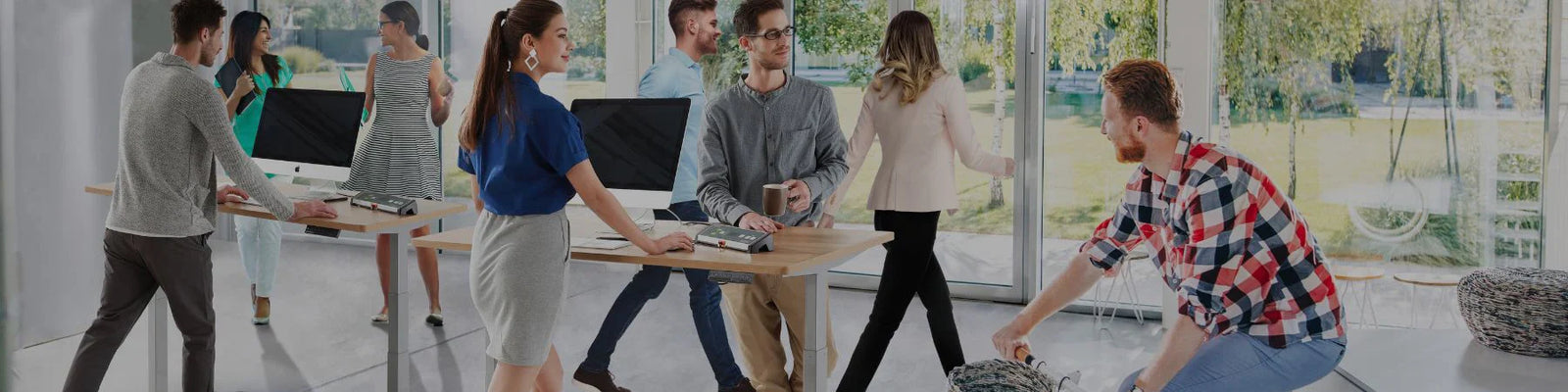 People working at treadmill desks in shared office