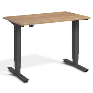 100cm Adjustable Height Desk - Pacto - Dark Grey Frame - Brown Oak Top - Studio Image