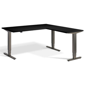 Corner Industrial Sit Stand Desk - Smyth - Black Top - Studio Image