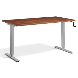 Crank height adjustable standing desk with a natural Dijon walnut desk top and silver frame