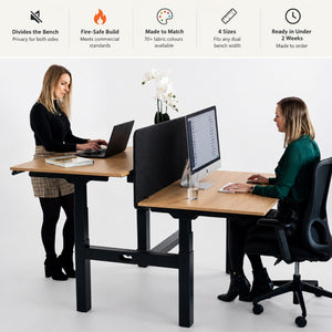 Desk top screen for sit stand dual bench desk shown between two users showing features