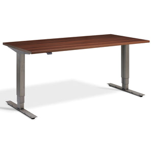 Industrial Adjustable Standing Desk - Raw Steel Smyth - Natural Dijon Walnut Top - Studio Image