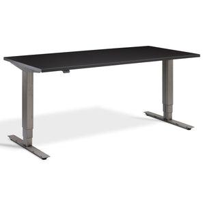 Industrial Adjustable Standing Desk - Raw Steel Smyth - Soft Black Top - Studio Image