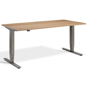 Industrial Standing Desk - Raw Steel Smyth - Brown Oak Top - Studio Image
