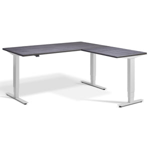 L-Shaped Adjustable Desk - Advance Corner - Light Grey Frame - Anthracite Sherman Oak Top - Studio Image