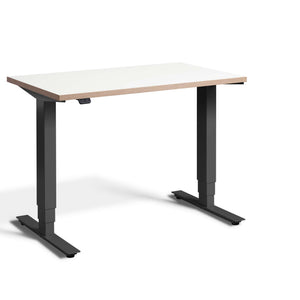 Pacto standing desk white ply edge top and anthracite frame viewed from front