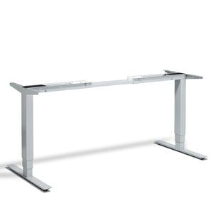 Silver electric standing desk frame taken from the front - the Masta