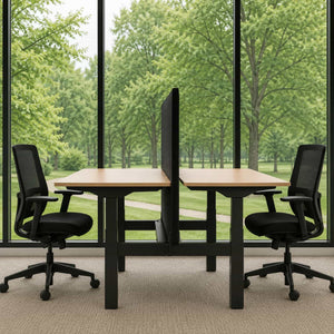 Sit stand dual bench desk screen shown in side view between two height-adjustable desks and task chairs