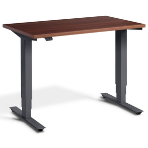 Small Walnut Standing Desk - Pacto - Natural Dijon Walnut Top - Anthracite Frame - Studio Image