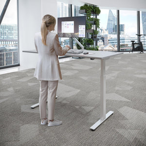 Smart Desk Adjustable - NeoActiv2 - Woman Using the Desk While Standing