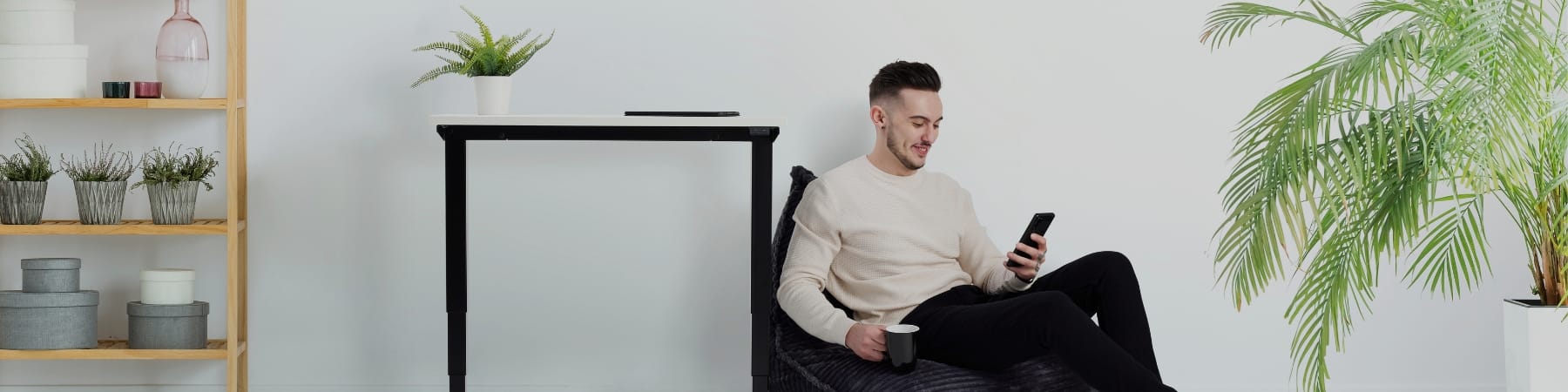 Minimalist standing desk in living room viewed from the front