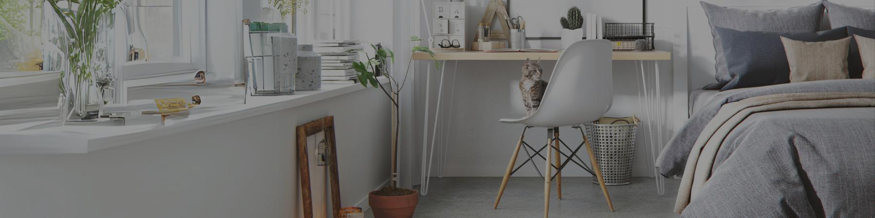 Hairpin legs on a desk in a bedroom viewed from the front