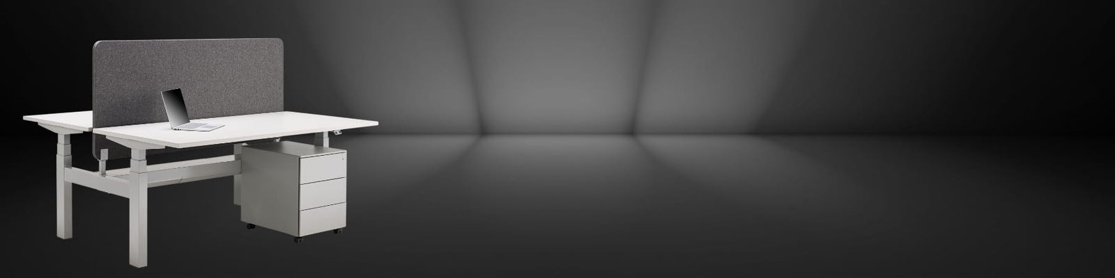 Two person standing desk viewed from front against a black background