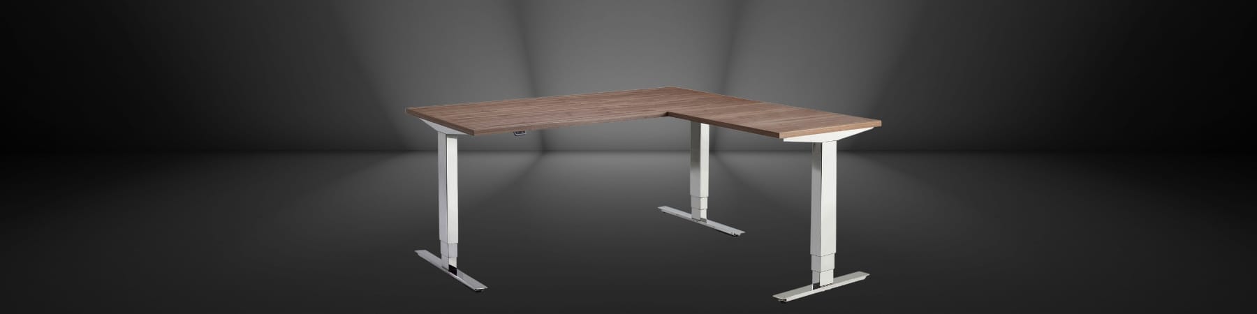 Corner walnut veneer standing desks viewed from the front