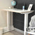 100cm white standing desk being used for home working - white frame with a white ply edge desk top