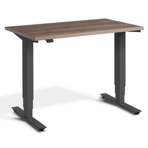 100cm Adjustable Height Desk - Pacto - Dark Grey Frame - Grey Nebraska Oak Top - Studio Image