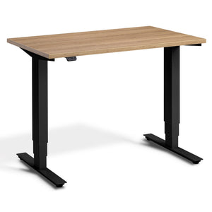 100cm Height Adjustable Desk - Pacto - Black Frame - Brown Oak Top - Studio Image