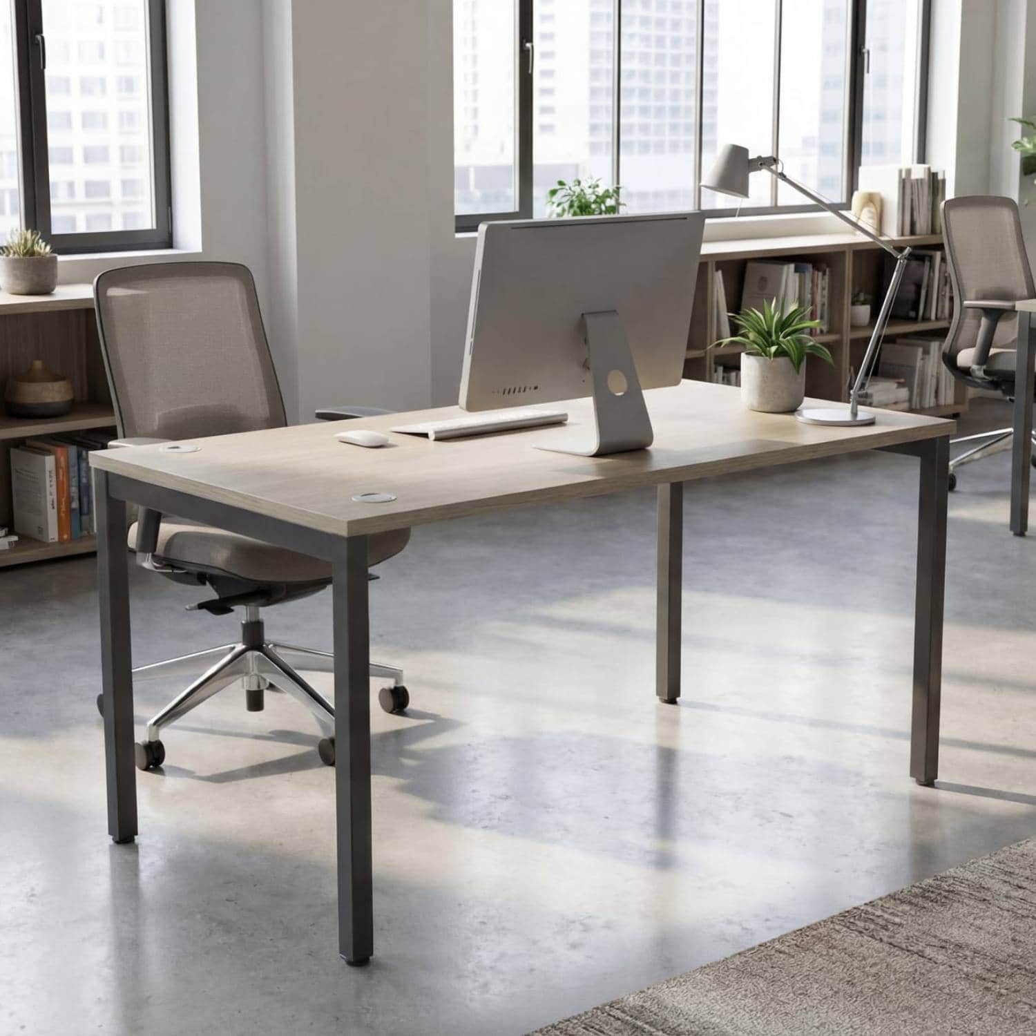 140cm desk with light oak desk top and black frame in a modern office