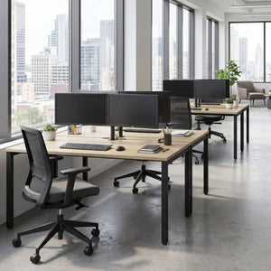 180cm desks with maple tops and black frames in a modern office workspace