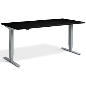 Advance Sit Stand Desk - Silver Frame - Black Top - Studio Image