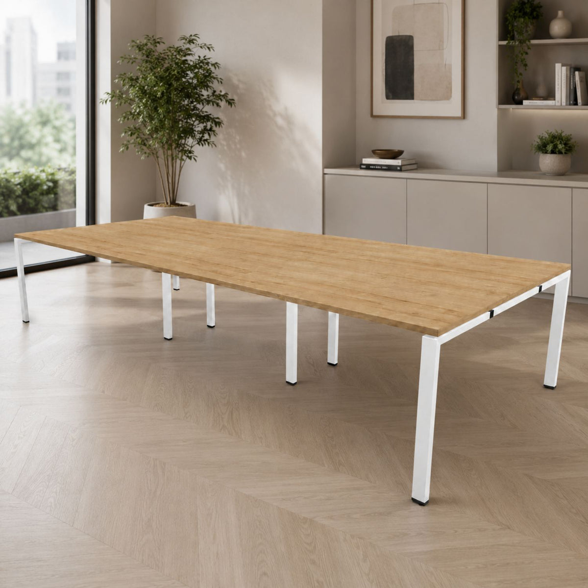 Bank of desks for 6 people with oak desktop and white frame shown in a modern office setting