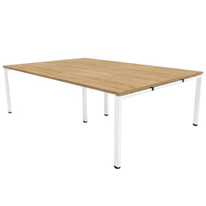 Bench desk for 4 people with oak desktop and white frame, designed as a shared workstation for four users