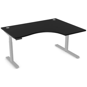 Curved height adjustable desk with 1600mm x 1200mm black desk top, silver frame and right-hand return