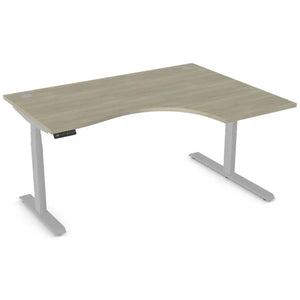 Curved standing desk with 1600mm x 1200mm arctic oak desk top, silver frame and right-hand return