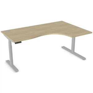 Curving standing desk with 1800mm x 1200mm urban oak desk top, silver frame and right-hand return