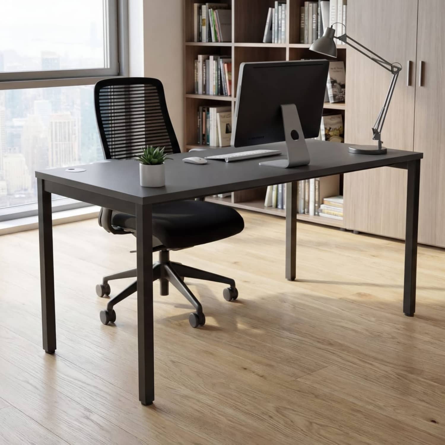 Desk 120cm wide with black desk top and black frame in a modern home office