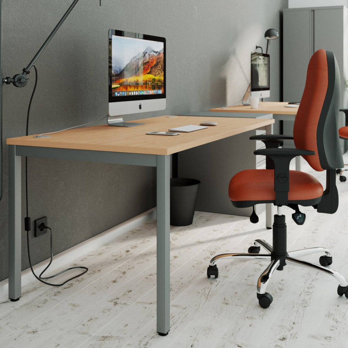 Desk 180cm wide with beech top and silver frame in a modern office