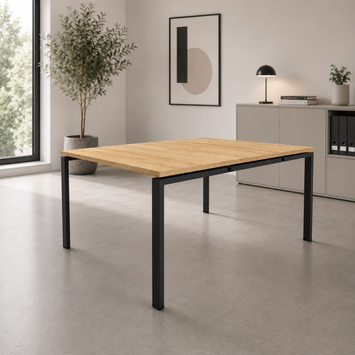 Dual desk for 2 people with oak top and black frame in a clean, modern office interior