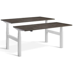 Duo adjustable desk with light grey frame and Dark Concrete desk tops