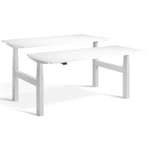 Duo adjustable desk with light grey frame and White desk tops