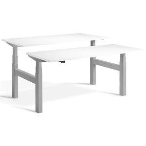 Duo adjustable desk with silver frame and White desk tops