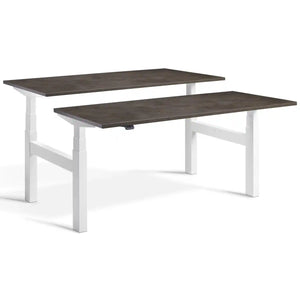 Duo adjustable desk with white frame and Dark Concrete desk tops