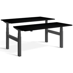 Duo height adjustable workstation with dark grey frame and Black desk tops