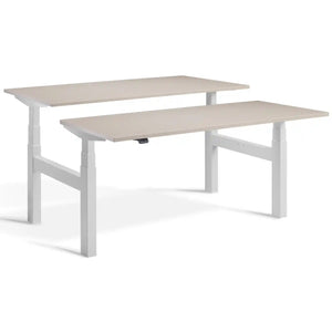 Duo sit stand desk with light grey frame and Stone desk tops