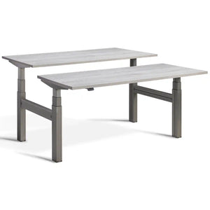 Duo sit stand desk with raw steel frame and Cascina Pine desk tops
