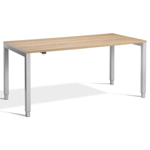 Four Leg Standing Desk - Rega - Silver Frame - Brown Oak Top - Studio Image