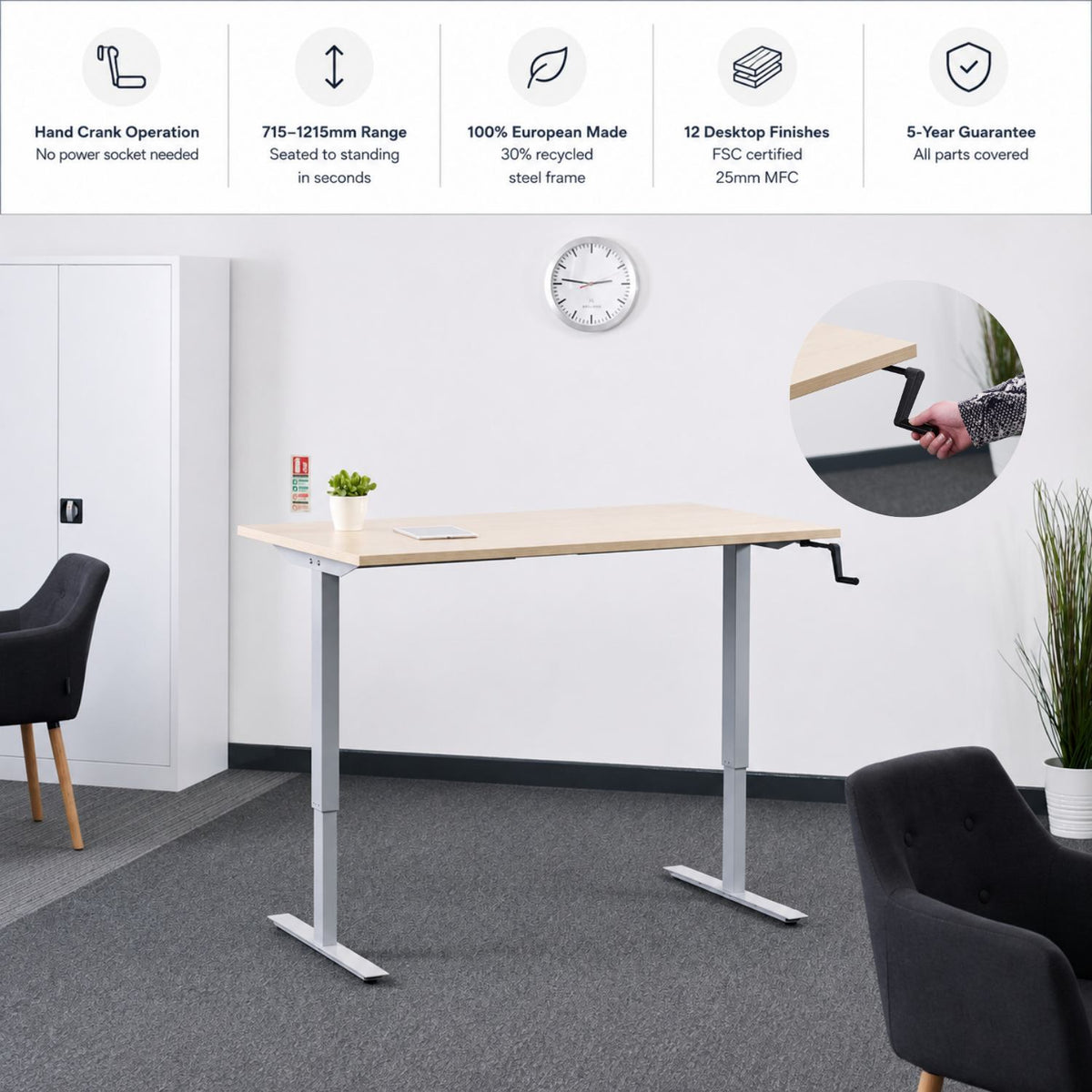 Hand crank standing desk in an office with 715–1215mm height range, European-made frame, 12 desk top finishes and 5-year guarantee