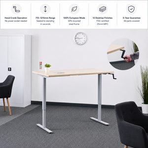 Hand crank standing desk in an office with 715–1215mm height range, European-made frame, 12 desk top finishes and 5-year guarantee