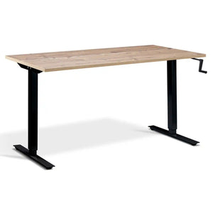 Hand crank standing desk with a timber desk top, black frame and manual adjustment handle