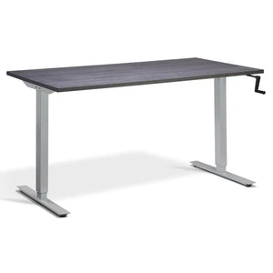 Hand crank standing desk with an anthracite Sherman oak desk top, silver frame and manual height adjustment handle