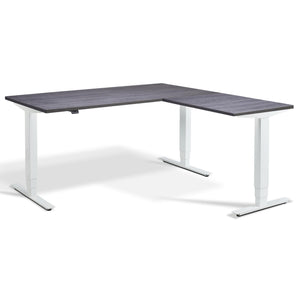 L-Shaped Adjustable Desk - Advance Corner - White Frame - Anthracite Sherman Oak Top - Studio Image