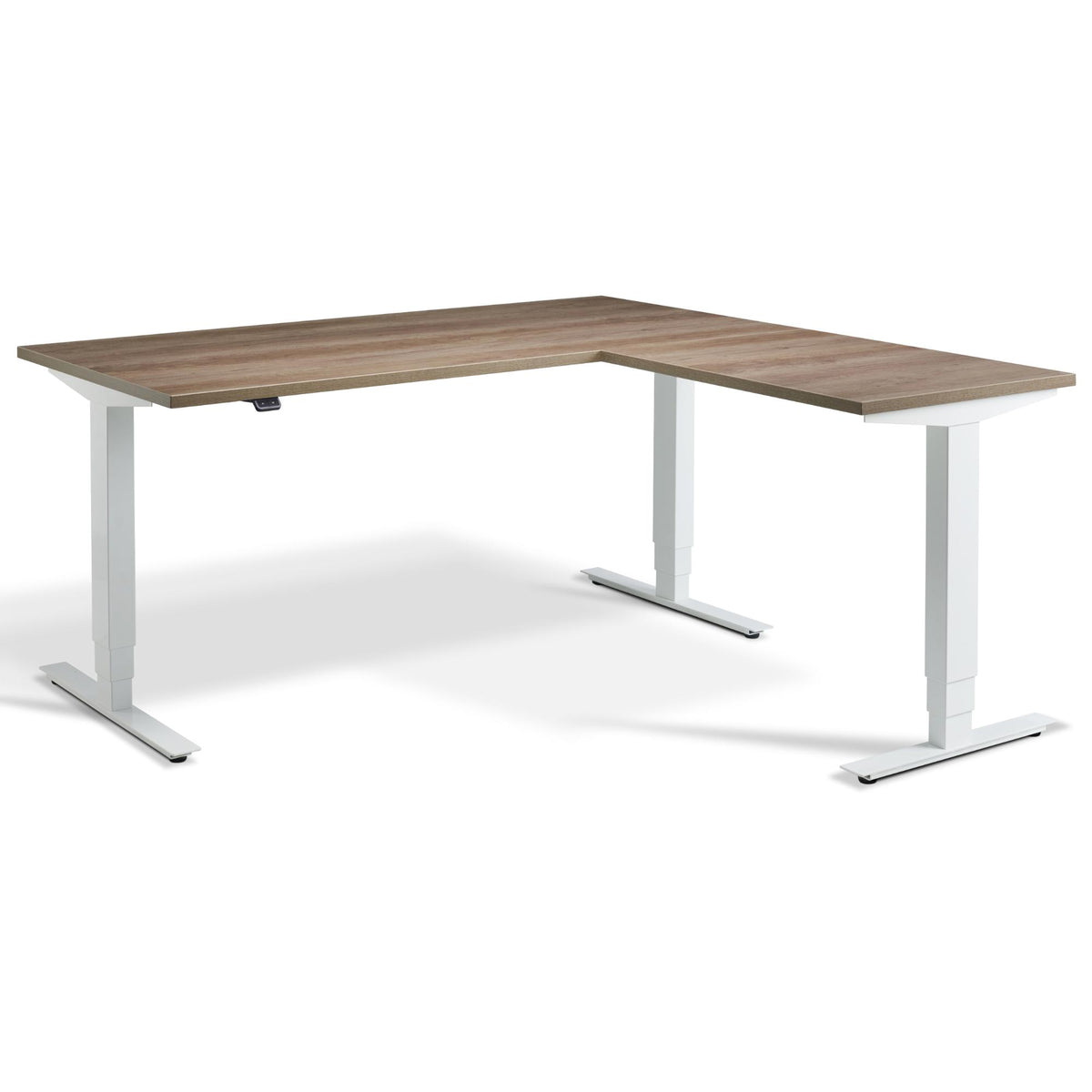 L-Shaped Adjustable Desk - Advance Corner - White Frame - Grey Nebraska Oak Top - Studio Image