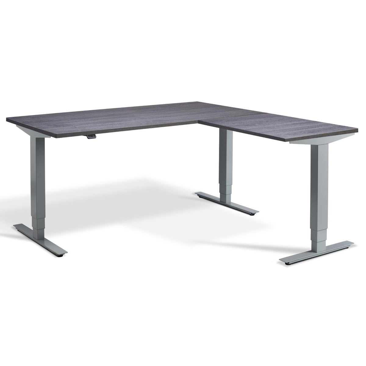 L Shape Sit Stand Desk - Masta Corner - Silver Frame - Anthracite Sherman Oak Top - Studio Image