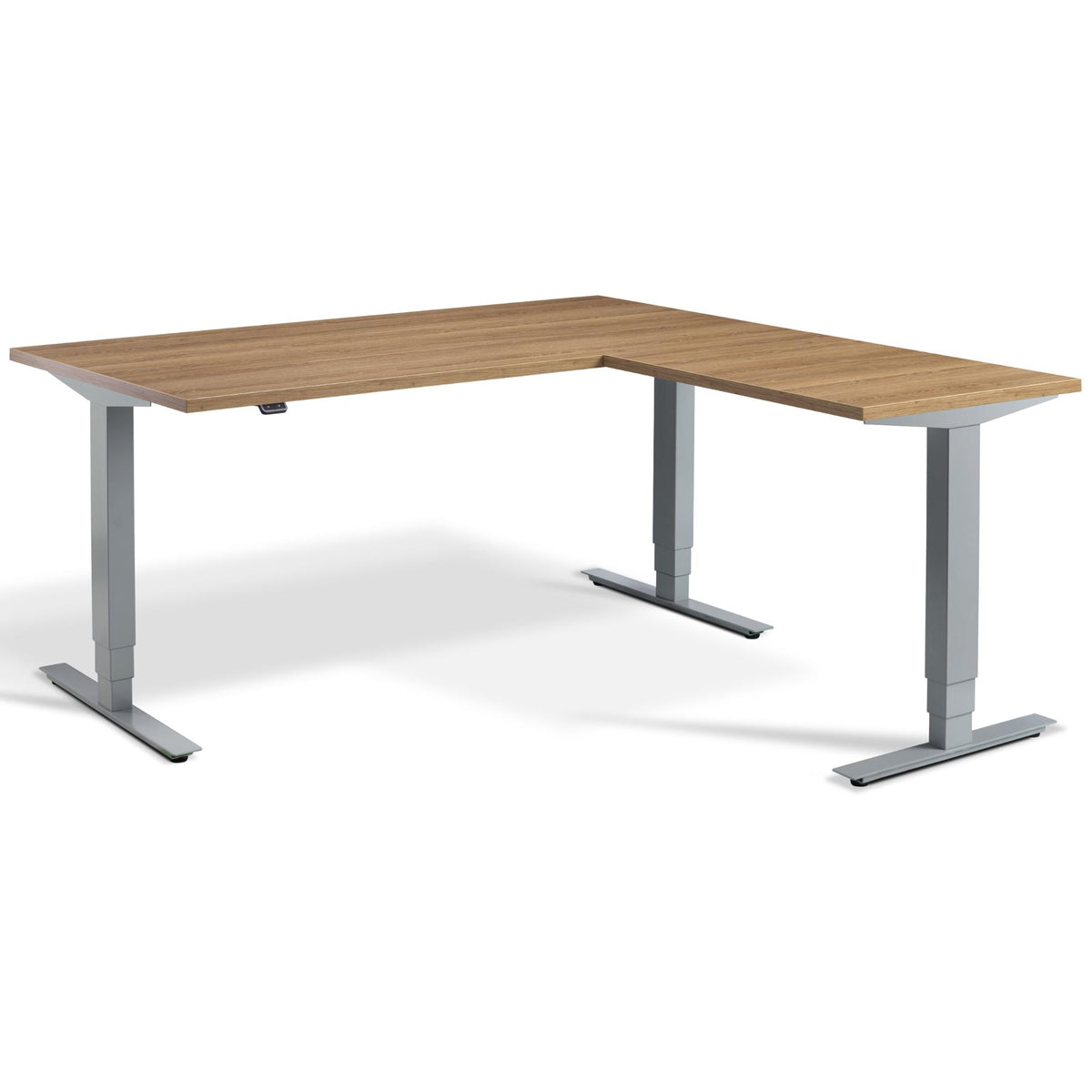 L Shape Sit Stand Desk - Masta Corner - Silver Frame - Brown Oak Top - Studio Image