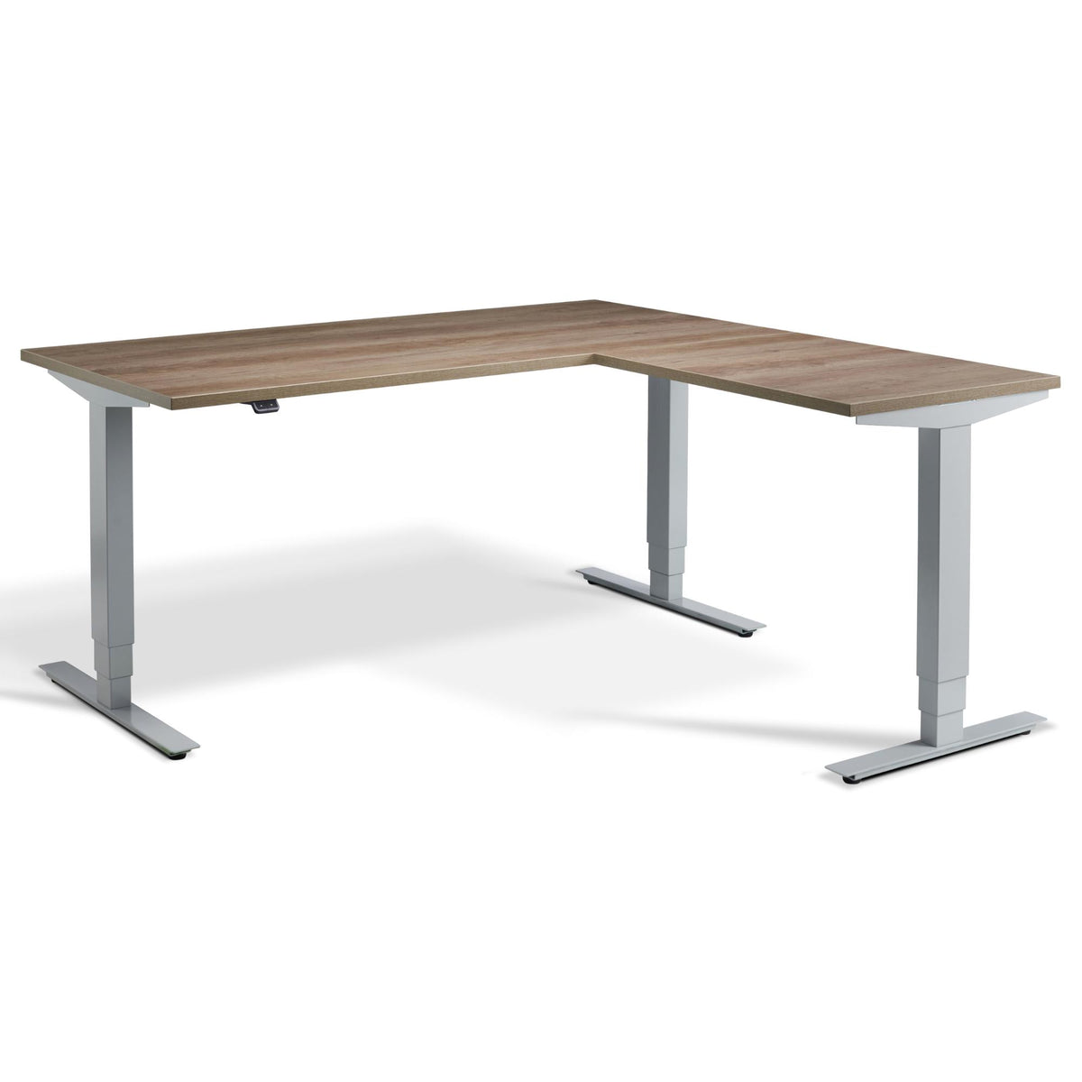 L Shape Sit Stand Desk - Masta Corner - Silver Frame - Grey Nebraska Oak Top - Studio Image