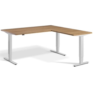 L Shaped Sit Stand Desk - Advance Corner - Light Grey Frame - Brown Oak Top - Studio Image